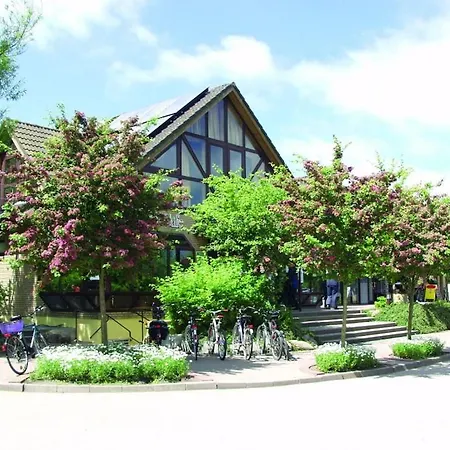 In A Thatched House By The *